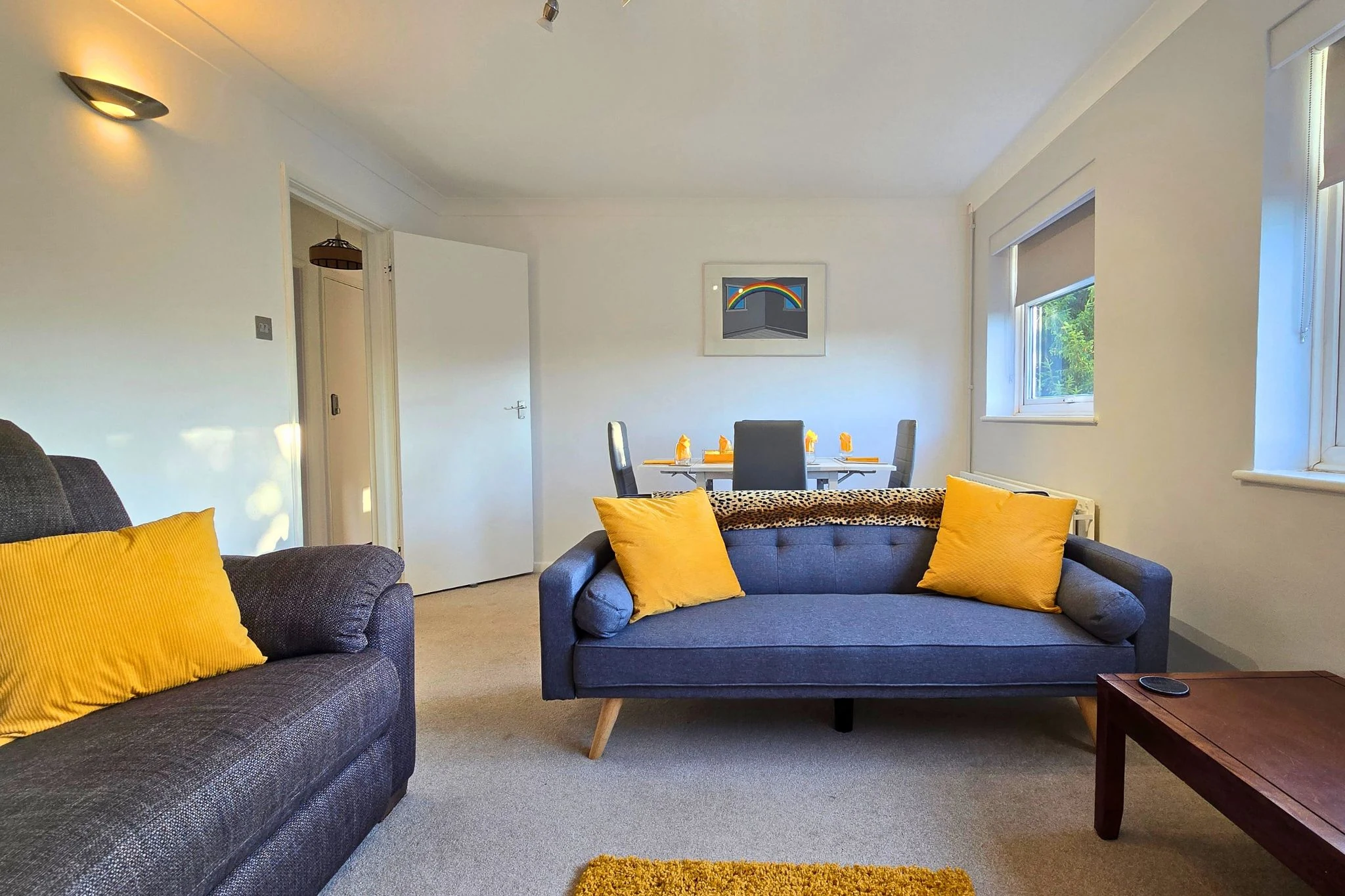 Comfortable sofa with cushions in the living area